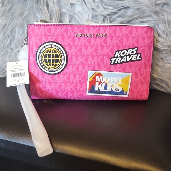 NWT Michael Kors Vibrant Pink Wristlet with Travel Patches - Picture 1 of 13